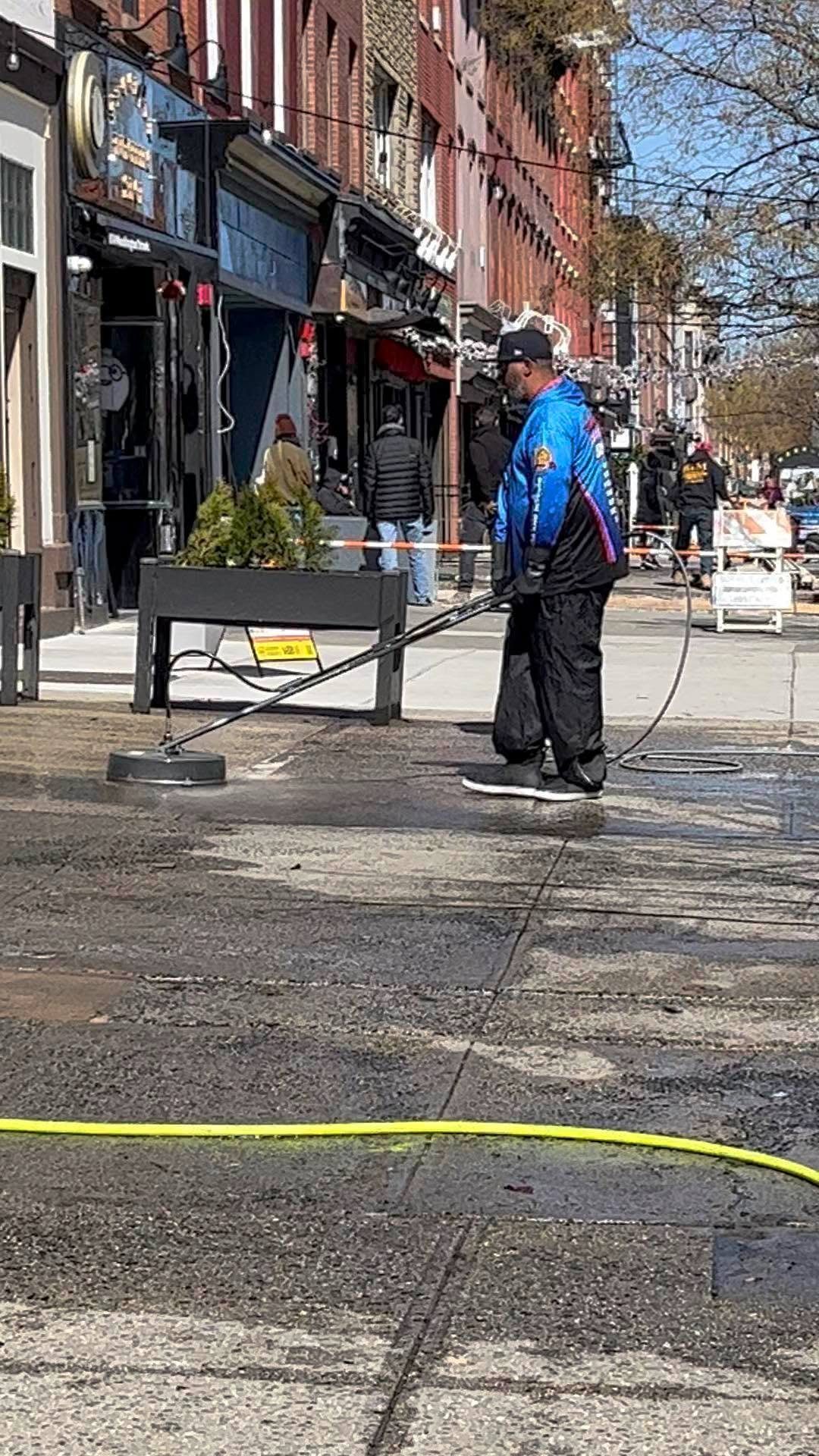 Premier Power Washerz surface cleaning a sidewalk on Washington Street in Hoboken