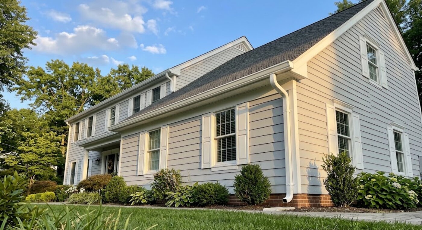 Clean gutter and downspout line on a two story home