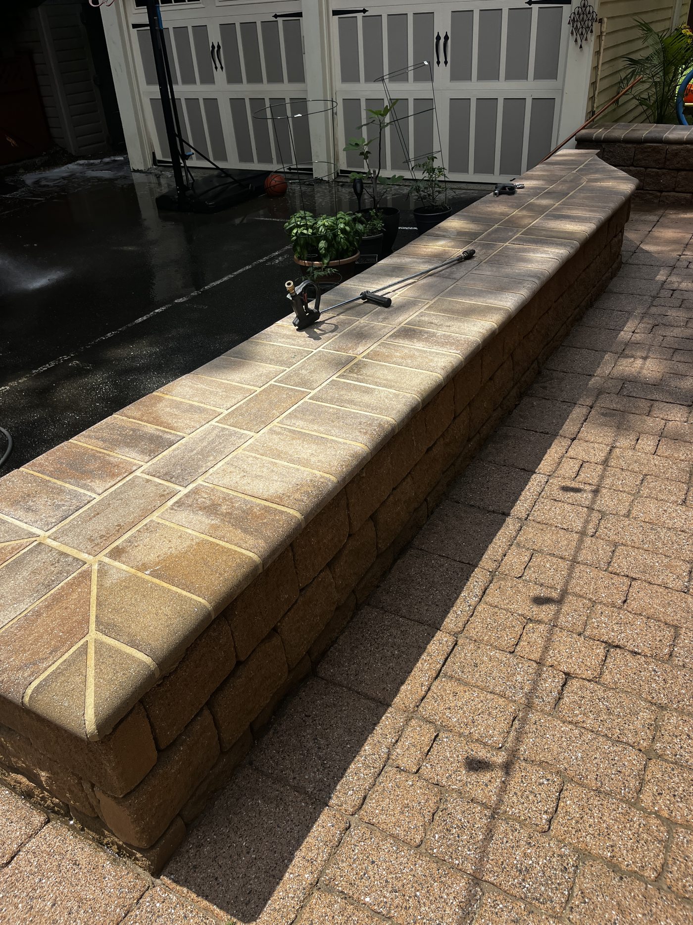 Paver seating wall freshly cleaned