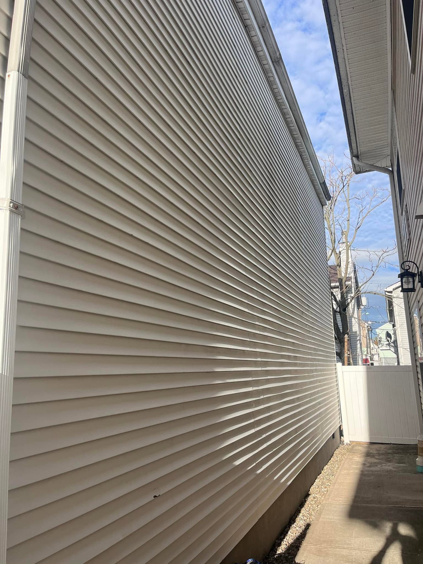 Bright clean vinyl siding after a soft wash